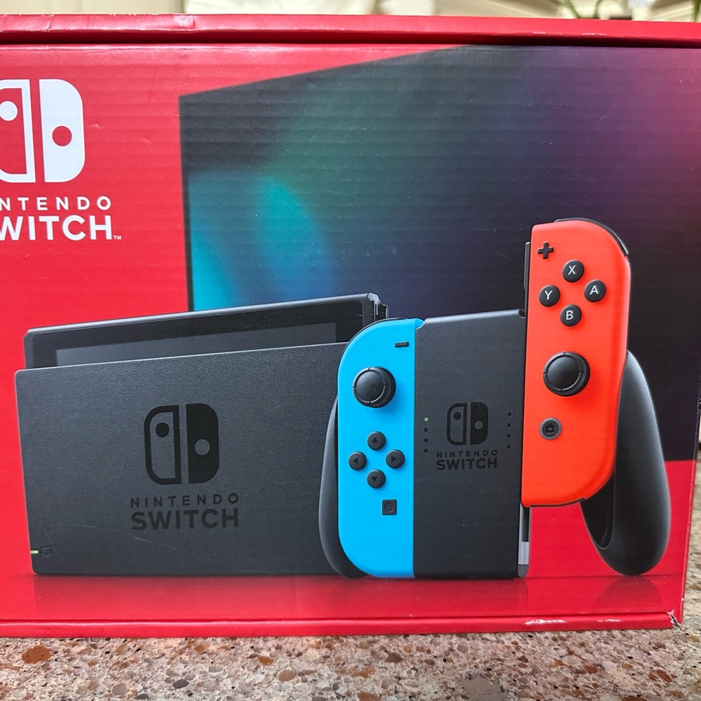 Nintendo Switch Console with Neon Blue and Red Joy-Con